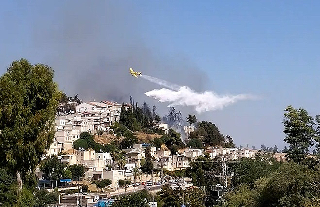 סטודנטים מהמכללה האקדמית צפת מסייעים לנפגעי השריפה בעיר